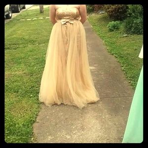 Gold prom dress with detachable train.